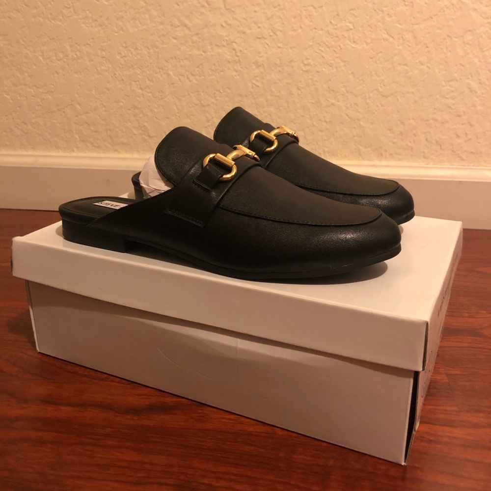 Steve Madden Black Royals Mules.